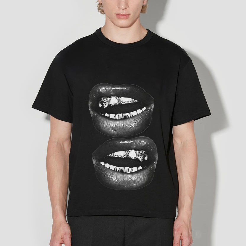 Person wearing a black t-shirt with graphic design on a white background